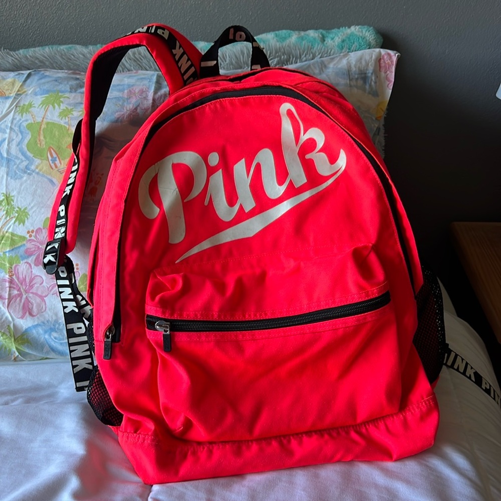 Pink Backpack With Multiple Compartments - image 1